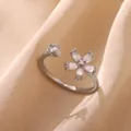 Detailed close-up showing the intricate crystal flower and open band design of the ring. - Flower Rhinestone Style (JZ4363P)