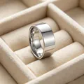 Close-up detail of a professional 8mm polished silver stainless steel plain ring band - US Size 8 / Mirror Plain Band Style / 8mm Wide / Silver