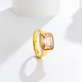 Close-up of elegant gold plated stainless steel ring featuring a large rectangular champagne zircon - Champagne (Gold Tone)