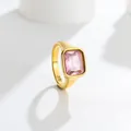 Close-up of an elegant gold titanium steel ring featuring a rectangular pink gemstone. - Size 7 / 方钻款式(C307) / Pink (Gold Band)