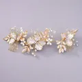 Peigne à cheveux de mariée avec fleurs en résine blanche, feuilles d'or et perles - Bandeau élégant à double peigne style forêt HS-J7115G