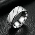 Professional detail view of 8mm stainless steel men's ring with brushed diagonal grooves - Size 7 / 8mm / Steel