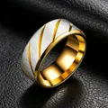 Detailed view of 8mm two-tone brushed silver and polished gold stainless steel ring - Size 7 / 8mm / Gold