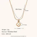 Détail d'un collier trèfle en acier inoxydable doré 18 carats avec dimensions. - Mini Pendentif Fleur en Coquille (N3232-3243)