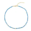 Detailweergave van de blauwe facet geslepen natuurstenen ketting met gouden kralen. - Ketting / 38+5cm / Aqua