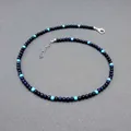 Gedetailleerd overzicht van handgemaakte vintage ketting met blauwe en turquoise kralen - Ketting / 38+5cm / Donkerblauw