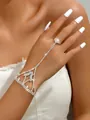 Detailed view of silver-toned rhinestone hand harness with finger ring and mesh pattern - Hollow Mesh Style (1004) / Silver