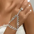 Close-up of sparkling rhinestone finger ring slave bracelet with geometric mesh design - Triangle Mesh Style (1003) / Silver