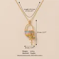 Collar colgante de cesta de esmalte con dijes de conejo y cruz de cobre - Estilo de Dije de Canasta Pintada