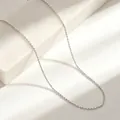 Macro view of high-quality minimalist silver titanium steel O-chain necklace links - 40+5cm / O Chain / Silver