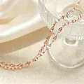 Macro detail of a minimalist rose gold titanium steel lip chain necklace with oval links - 40+5cm / Lips Chain / Rose Gold
