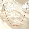 Detailed view of an elegant rose gold twisted rope chain necklace on a sparkling background - 40+5cm / Fine Braided Chain / Rose Gold