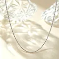 Close-up detail of a minimalist silver titanium steel rope chain necklace for daily wear. - 40+5cm / Fine Braided Chain / Silver