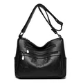 Sac à bandoulière en cuir noir avec motif trèfle en relief et poches zippées multiples - Noir