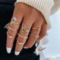 Chic 7-piece gold-tone knuckle ring set featuring butterfly moon and star crystal designs - Gold Butterfly Star Moon Point Drill Style (5598301) / 7-Piece Set