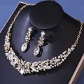 Exquisite gold-tone necklace and drop earring set with sparkling clear crystals - Gold White