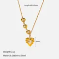 Gold stainless steel necklace featuring a textured heart pendant and a central pearl - Lava Heart Style (CH1741)