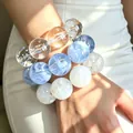Stack of oversized translucent and marble blue resin beaded bracelets for a vintage look - Set of 3 / Multicolor