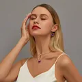 Detail of elegant gold double-layered butterfly necklace and earrings set on model - KC Gold Purple Set 6410 (2-Piece Set)