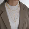 Set de nueve collares dorados con colgantes de mariposa y corazón con cristales - 6665501HB / Collar