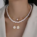 Elegante conjunto de collares multicapa con perlas y colgantes de corazón - 6658501HB / Collar