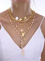 Conjunto de collares dorados de varias capas con perlas y colgantes - 6670601HB / Collar