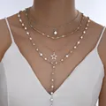 Elegante set de collares de capas plateados con colgantes de estrella y cuentas blancas - 6673301HB / Collar