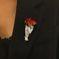Creative silver bouquet brooch with realistic red roses pinned on a black blazer - Silver
