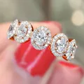Elegante anillo de eternidad en oro rosa con cinco circonitas ovaladas en halo para mujer - Talla 5 / Rosa oro