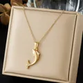 Elegant golden dolphin pendant necklace with sparkling rhinestones on stainless steel chain. - Gold Dolphin Rhinestone Accent Style (N4548)