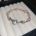 Detailed macro view of an elegant pearl bracelet with a pavé zircon clasp in box - Lavender-Pink Micro-Pave Style (45#) / Silver
