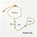 Elegante bracciale da mano in acciaio inossidabile placcato oro con strass raffinati - Stile Quattro Strass Bianchi (E2505)