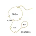 Elegante catena per mano in acciaio inossidabile placcato oro con motivi circolari e misure - Stile Cinque Perle Artificiali (E2550)