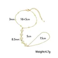 Bracciale da dito in acciaio inossidabile dorato con quadrifogli e misure dettagliate. - Stile Quadrifoglio 5 Strass Bianchi (E2508)