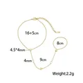 Catenina da mano in acciaio inossidabile dorato con cuori e zirconi - Stile Cuore Strass Bianco (E2558)
