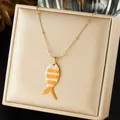 Close-up of striped orange and white fish pendant on gold satellite chain necklace. - Orange and White Striped Fish Satellite Chain Style (N4533)