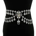 Detailed view of silver bohemian double-layer waist chain with coin charms and shell pendant. - Silver