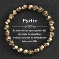 Macro detail of faceted natural pyrite stone bead bracelet for wealth and success - Pyrite