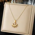 Close-up of gold-plated sun-eye pendant necklace with sparkling crystal detail - Eye Sun Flower Style (N4536)