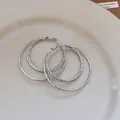 Elegant double layer silver hoop earrings with textured finish on white ceramic plate - Minimalist Double Layer Hoop (86# 925 Sterling Silver Earring Post) / Silver