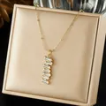 Detail of geometric pendant with stacked rectangular zircons on a gold bamboo chain - Square White Zirconia Vertical Array Style (N4534)
