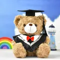 Cute brown teddy bear plush wearing a black graduation gown and cap with red bowtie - Dark Brown (Gray Collar)