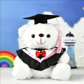 Adorable white graduation teddy bear plush toy wearing a black gown and doctor cap - White (Pink Collar)