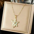 Close-up detail of an elegant gold starfish pendant with pearls and light blue enamel inlay - Light Blue Sea Star Artificial Pearl Inlaid Style (N4525)