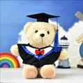 Cream-colored graduation teddy bear plush toy wearing black academic gown and mortarboard - Beige (Blue Collar)