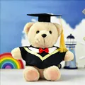 Cuddly graduation teddy bear plush toy wearing a black bachelor gown and yellow tassel - Beige (Yellow Collar)