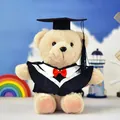 Soft plush graduation teddy bear wearing black cap and gown, ideal academic gift for students - Beige (White Collar)