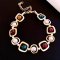 Elegant retro palace style gold necklace featuring colorful resin beads and white pearls - Bracelet-Gold-Multicolor