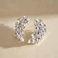 Close-up of sparkling feather stud earrings with marquise-cut crystals in silver. - Stud Pin Style / White