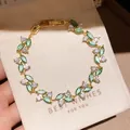 Elegantes Goldarmband mit marquise-geschliffenen grünen und klaren Zirkonia Steinen - Grüner Marquise-Rankenstil (53#)